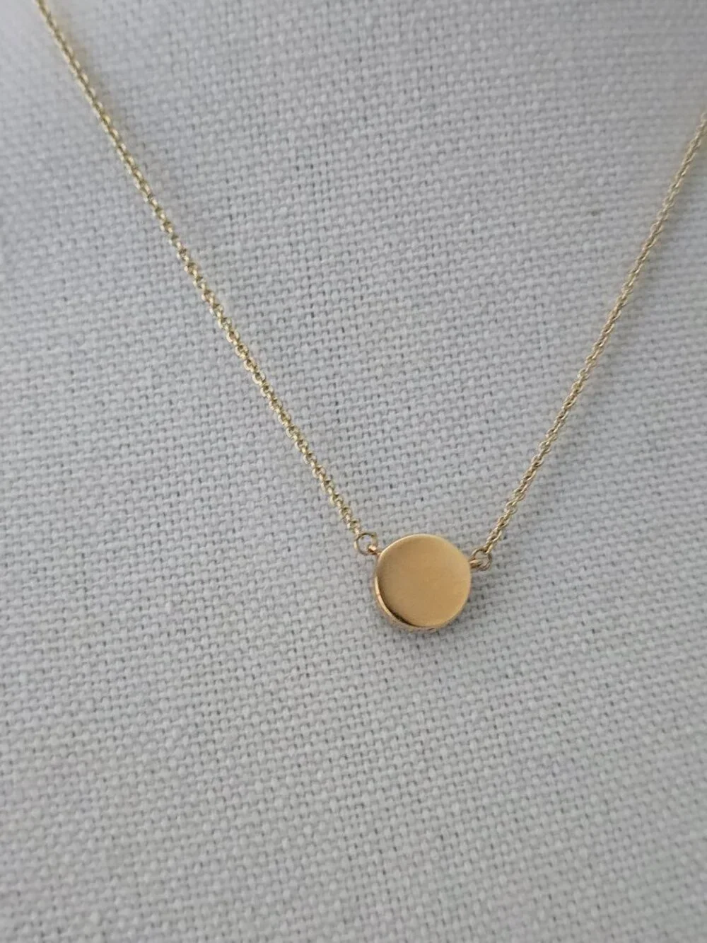 Tory Burch Gold Chain Necklace with Black Round Logo Pendant